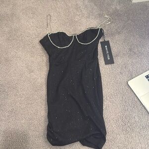 Black sparkly statement piece for any night or event!